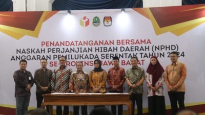 Bupati Iwan Setiawan Teken Naskah Perjanjian Hibah Daerah Anggaran Pemilukada Serentak 2024