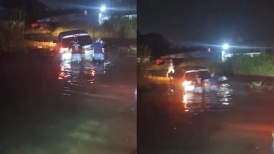 Mobil Mini bus Terperosok di Jalan Bomang Tajurhalang Terekam Ponsel Warga