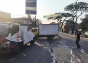 Sopir Tak Konsentrasi, Truk Box Terguling di Jalan Alternatif Cibubur